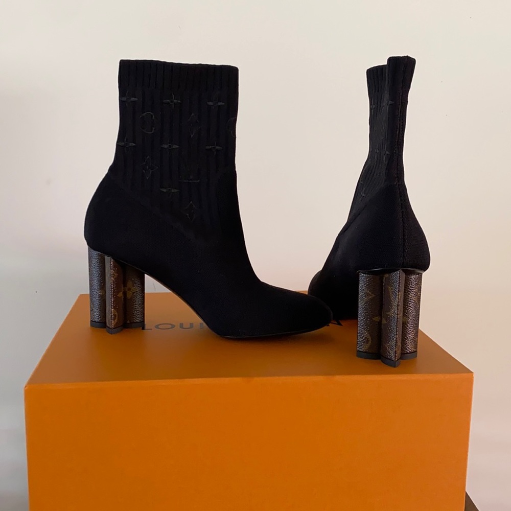 LVbrand new boots. Still have receipt.